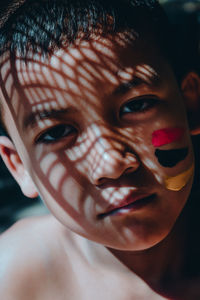 Close-up portrait of smiling boy