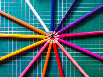 Full frame shot of multi colored pencils on table