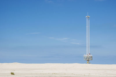 Communication tower on beach