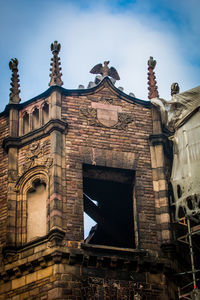 Low angle view of historic building against sky