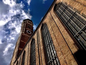 Low angle view of clock tower against sky