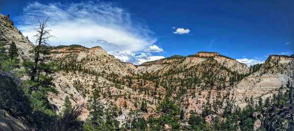 Panoramic view of rocky mountains against sky