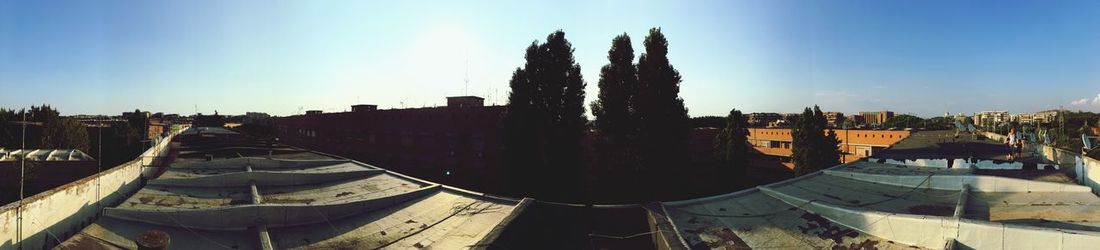 High angle view of buildings in city against clear sky