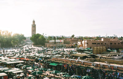 High angle view of city buildings against sky