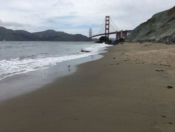 View of suspension bridge over sea