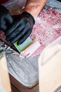 Midsection of man preparing food