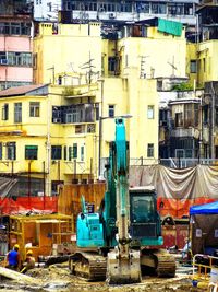 Earth mover at construction site in city