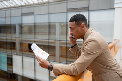 Young man using mobile phone