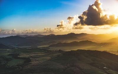 Scenic view of landscape against sky during sunset