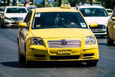 Yellow car on road