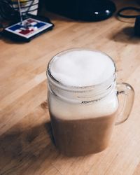 High angle view of coffee cup on table