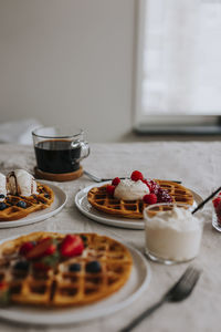 High angle view of waffles on plates