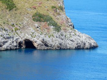 Scenic view of rock formation in sea