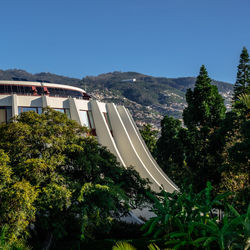 High angle view of mountain against clear blue sky