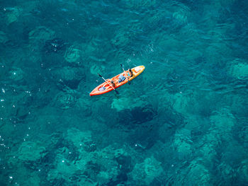 High angle view of canoe in sea