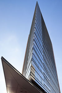 Low angle view of modern building against clear sky