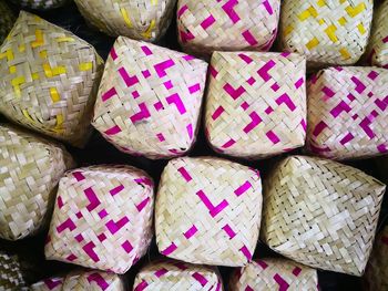 Close-up of wicker baskets for sale in market