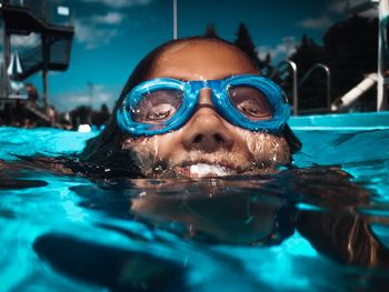 Girl swimming in pool