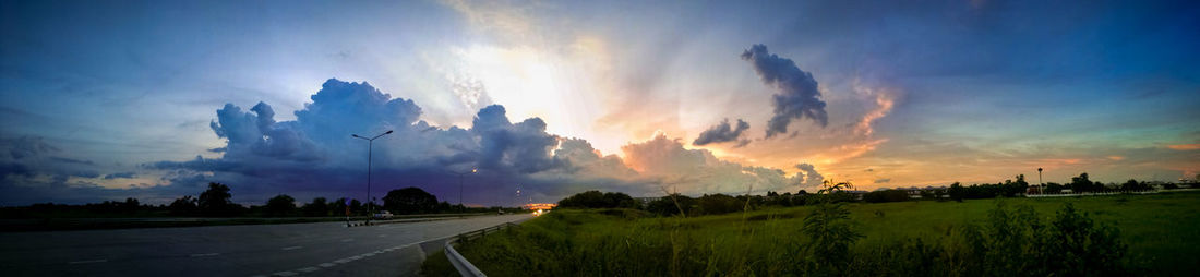 Panoramic view of road against sky during sunset