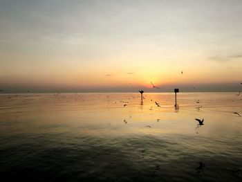 Scenic view of sea against sky during sunset