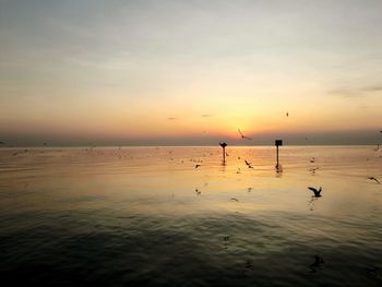Scenic view of sea against sky during sunset