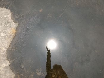 High angle view of illuminated rock against sky