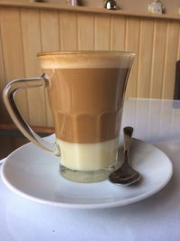 Close-up of coffee cup on table