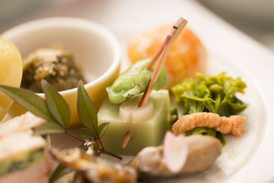 Close-up of served food in plate