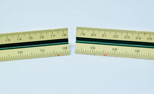 Close-up of design on table against white background