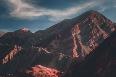 View of mountain range against cloudy sky