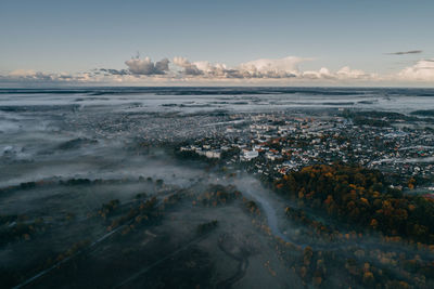 High angle view of sea against sky during sunset