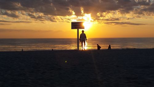 Scenic view of sea at sunset