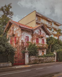 Street by building against sky