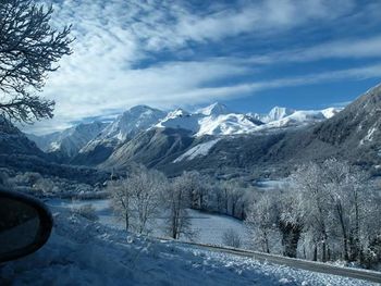 Scenic view of snow covered mountains