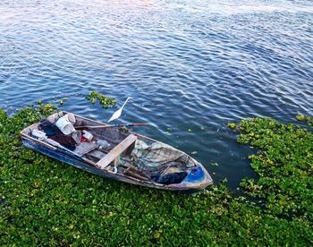 High angle view of boat floating on lake