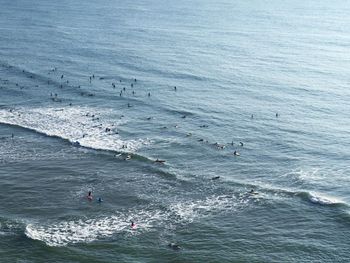 High angle view of people at sea