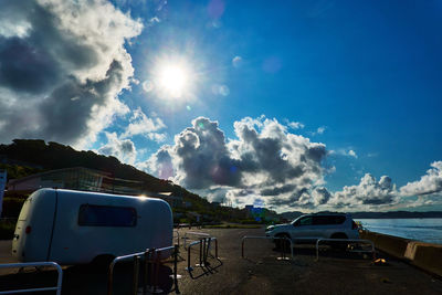Panoramic view of road against blue sky