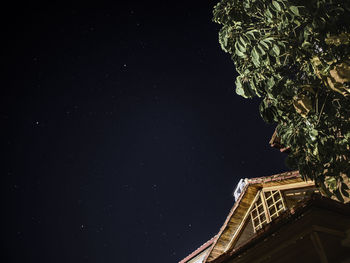 Low angle view of building against sky at night