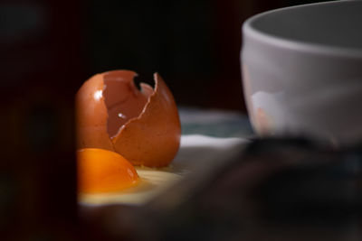 Close-up of orange juice on table