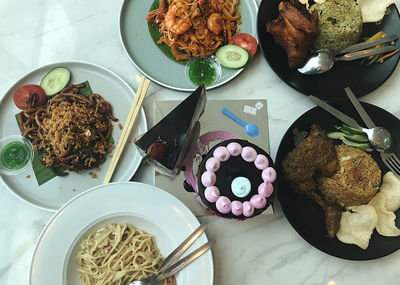High angle view of food served on table