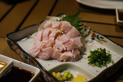 High angle view of meat in plate on table