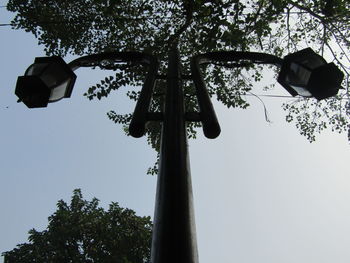 Low angle view of street light against sky