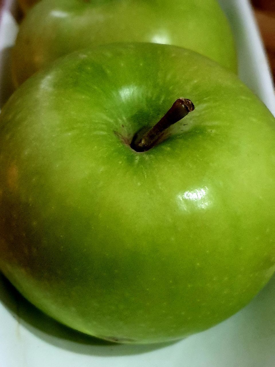 CLOSE-UP OF APPLE