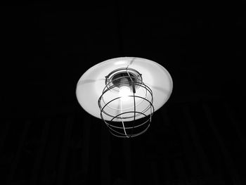 Low angle view of illuminated light bulb