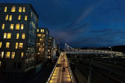 Illuminated suspension bridge at night