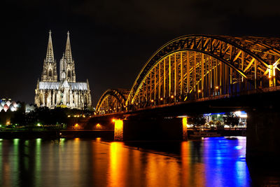 Hohenzollern bridge and cologne cathedral at night