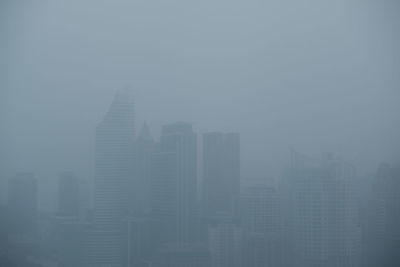 Modern buildings in city against sky