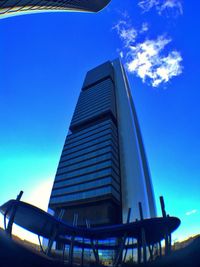 Low angle view of building against blue sky