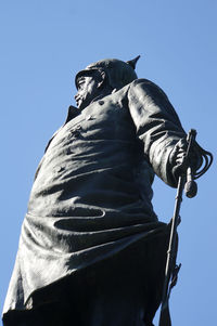 Low angle view of statue against clear sky