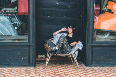 Woman sitting on chair